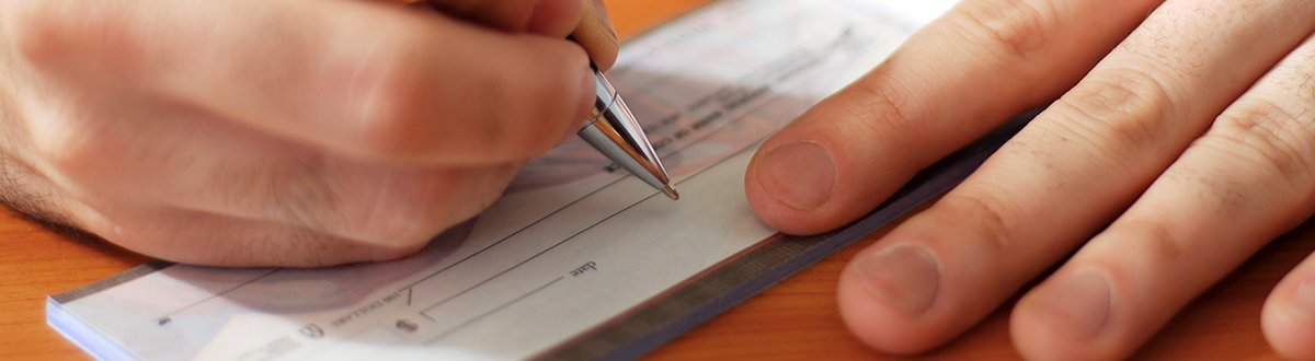 Man writing a check